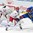 SPISSKA NOVA VES, SLOVAKIA - APRIL 16: Belarus's Maxim Nikitsin #13 battles with Sweden's Rickard Hugg #15 while Andrei Grishenko #1 looks on during preliminary round action at the 2017 IIHF Ice Hockey U18 World Championship. (Photo by Steve Kingsman/HHOF-IIHF Images)

